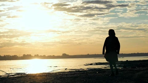 Silhouette at sunset river Video stock 110490587