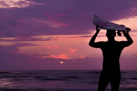 Silhouette surfer Foto stock