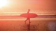 Silhouette Of Surfer At Sunset Sunlight Slow Motion Video Stock Footage