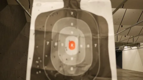 A Silhouette target at a gun range slides away from the camera - normal version Video stock 91993022