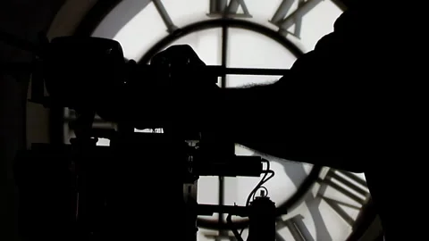 Silhouette of Technician Lubricating Clockwork Mechanism in Tower - 4K Video stock 341582474