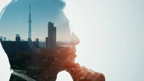 Silhouette of thinking man and modern cityscape. Double exposure. Stock Footage 149158563