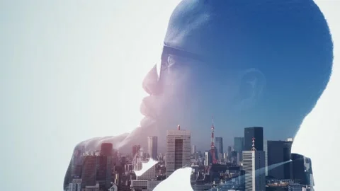 Silhouette of thinking man and modern cityscape. Double exposure. Stock Footage 149158591