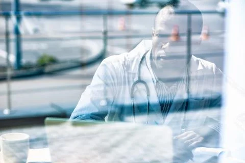 Silhouette of thoughtful man that making notes Stock Photos
