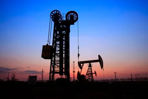 The silhouette of tower type pumping unit Stock Photos