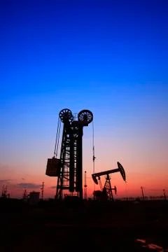 The silhouette of tower type pumping unit Stock Photos