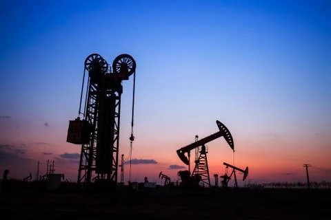 The silhouette of tower type pumping unit Stock Photos