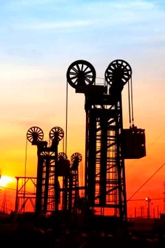 The silhouette of tower type pumping unit Stock Photos