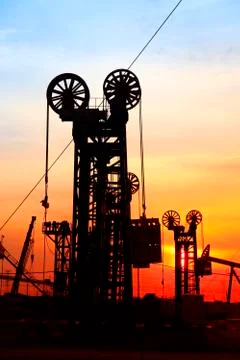 The silhouette of tower type pumping unit Stock Photos