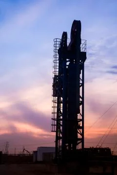 The silhouette of tower type pumping unit Stock Photos