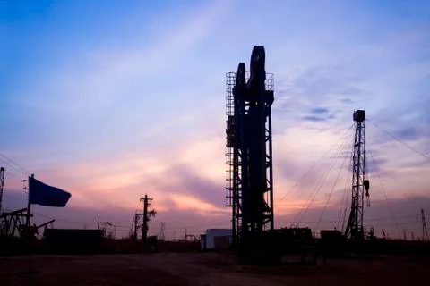 The silhouette of tower type pumping unit Stock Photos