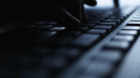 Silhouette Two Hand Typing on Black Keyboard Personal Computer Stock Footage 290468402