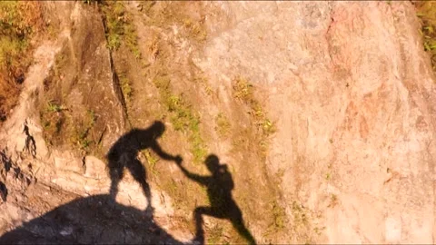 Silhouette of two hikers Stock Footage 317294418