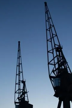 Silhouette of two metallic structures Stock Photos