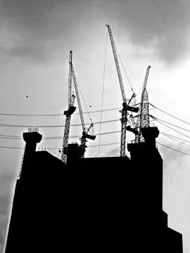 Silhouette Under Construction tower with sky Foto stock