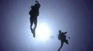 Silhouette View Scuba Diving Couple Stock Footage