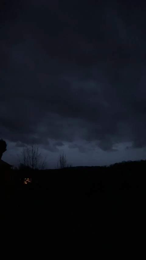 Silhouette walking on a dark cloudy night Stock Footage 170662422