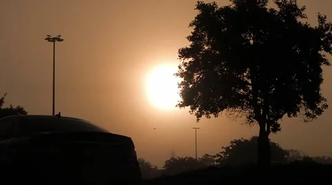 Silhouette, walking past view of sunset Stock Footage 45300392