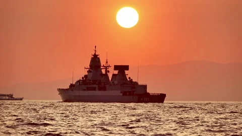 Silhouette Of Warship In The Sunset Stock Footage 219647100