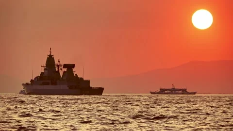 Silhouette Of Warship In The Sunset Stock Footage 219647620