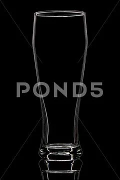 Silhouette of white beer glass with clipping path on black background Stock Photos