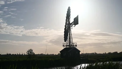 Silhouette of windmill at sunset in Netherlands. Stock Footage 221592861
