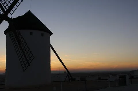 Silhouette of Windmill at Sunset Stock Photos