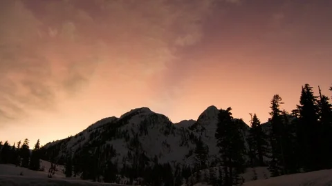 Silhouette of winter mountains with trees and sunsetting sky background Stock Footage 121578730