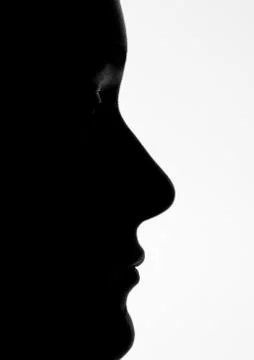 Silhouette of a Woman's Profile Stock Photos