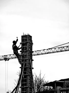 Silhouette worker on a construction site,b&amp;w Stock Photos