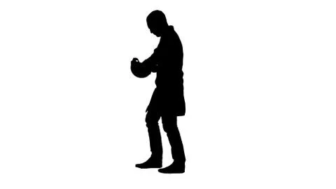 Silhouette Young construction engineering student walking and putting cap on. Stock Illustration