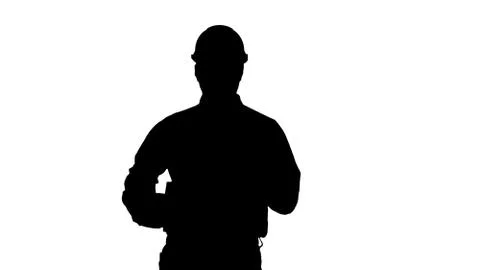 Silhouette Young happy engineer worker in a helmet showing we did it gesture. Stock-Illustration