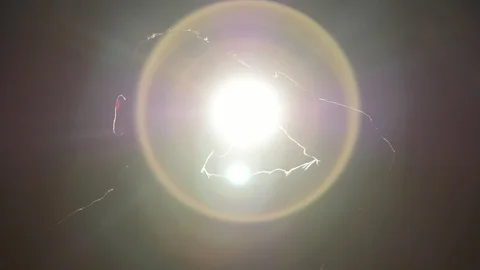 Silhouette of young man looking at camera and touching his hair in the dark room Video stock 106153754