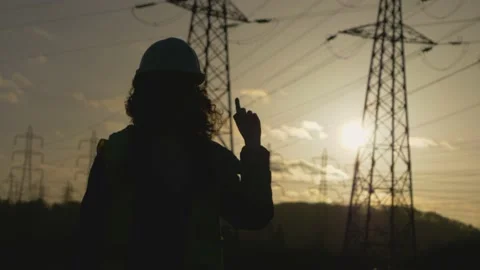 Silhouette of young Woman Constructor Point finger and her hand. Stand on fie Stock Footage 149487523