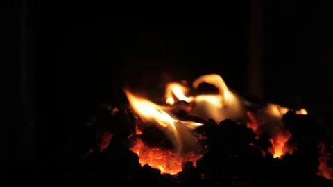Silhouetted coal and fire at a foundry Video stock 90934067
