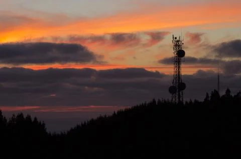 Silhouetted Communication Tower Stock Photos