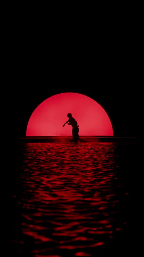 Silhouetted Dancing On Red Halo Background Stock Footage 255537856