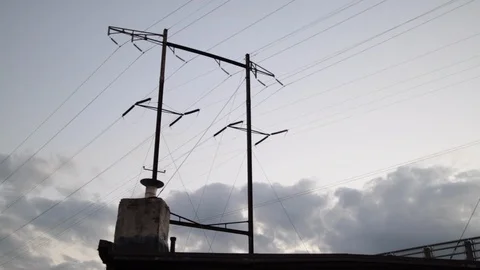 Silhouetted electrical post dusk Stock Footage 97095642