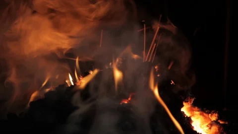 Silhouetted fire and coal at a foundry Stock Footage 90932780