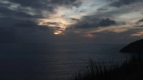 Silhouetted Grass on a Cliff's Edge at Sunset. Achill Island, Ireland. Stock Footage 239548492