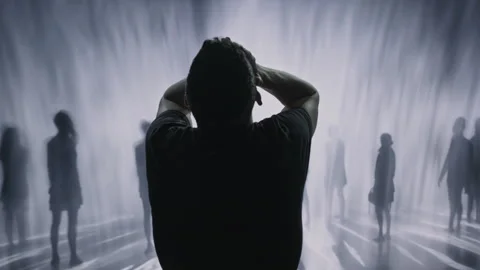 Silhouetted Man Facing Mysterious Crowd Mental Health Anxiety Depression Stock Footage 288886121