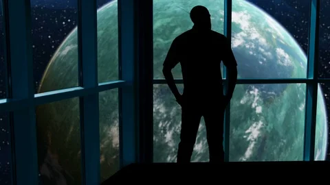 Silhouetted man overlooking the Earth from space. Stock Footage 112892044