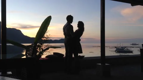 Silhouetted marriage proposal  Video stock 136587216