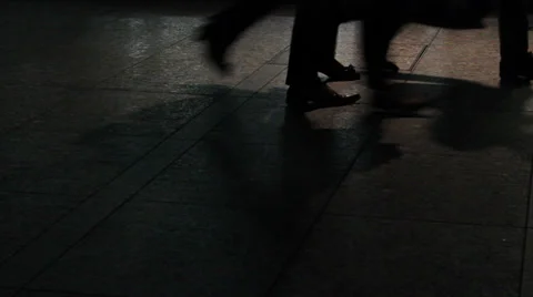 Silhouetted people walking Stock Footage 25822007