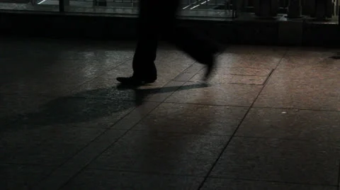 Silhouetted people walking Stock Footage 25822015