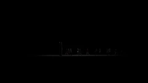 Silhouetted People Walking Towards a Bright Light Stock Footage 320100200