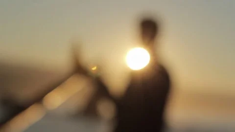 Silhouetted surfer with board Stock Footage 71207170