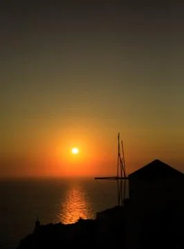 Silhouetted windmill Stock Photos