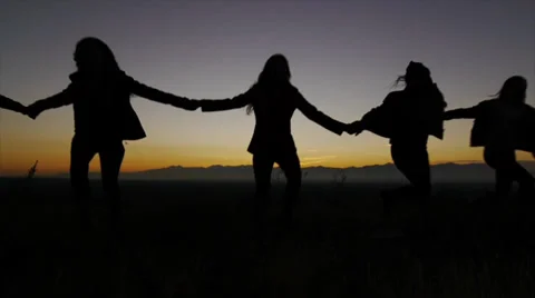 five friends holding hands