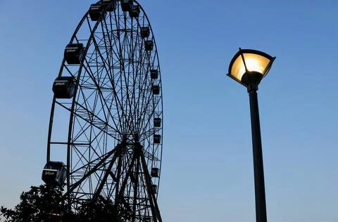 Silhouettes and lantern Stock Photos
